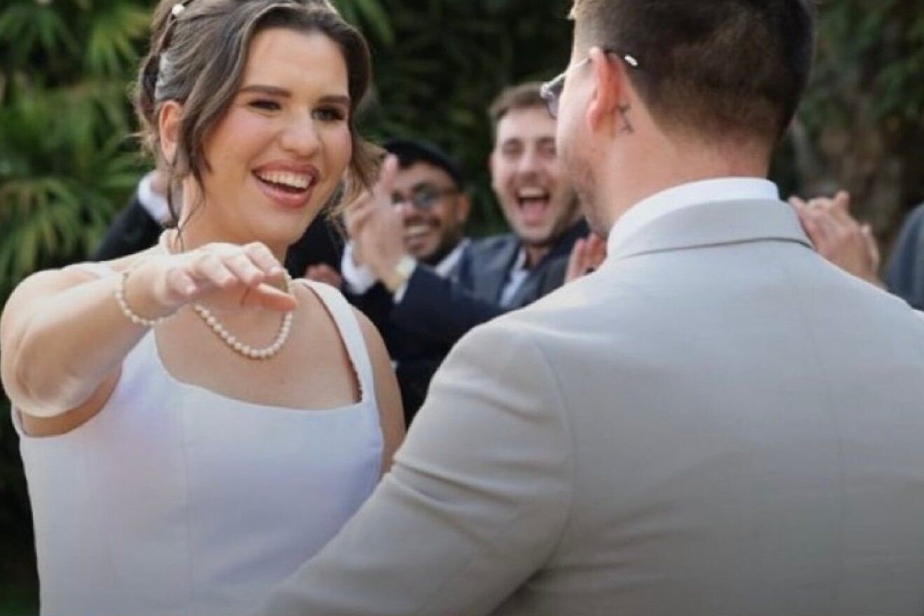 Hostage from October 7 massacre marries after remarkable recovery